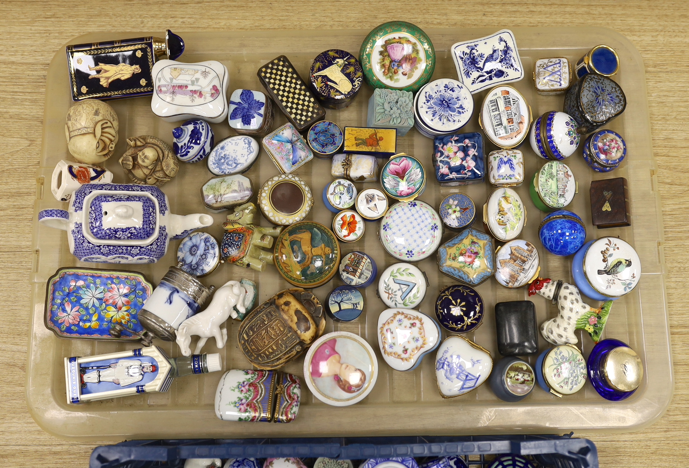 A collection of miniature boxes, snuff boxes, pillboxes and other miniature novelty items